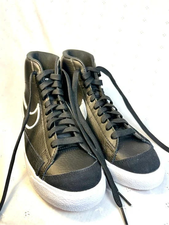 Nike Black High-Top Sneakers with White Tongue Text