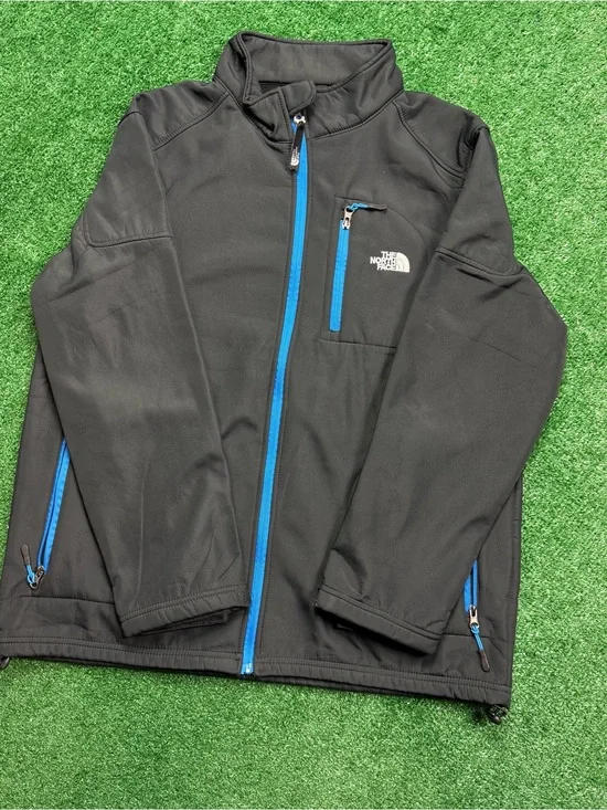 The North Face Black Jacket with Blue Zipper Accents