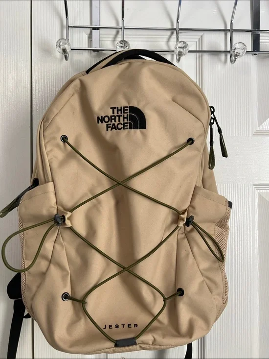 The North Face Jester Backpack in Beige with Olive Bungee