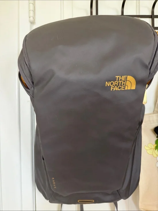 The North Face Black Backpack with Gold Logo Accent Kaban