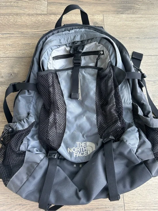 The North Face Gray and Black Backpack with Mesh Pockets