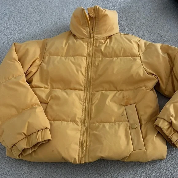Yellow puffer jacket