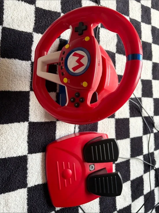 Nintendo Red Mario Racing Wheel with Blue Accent and Yellow Buttons