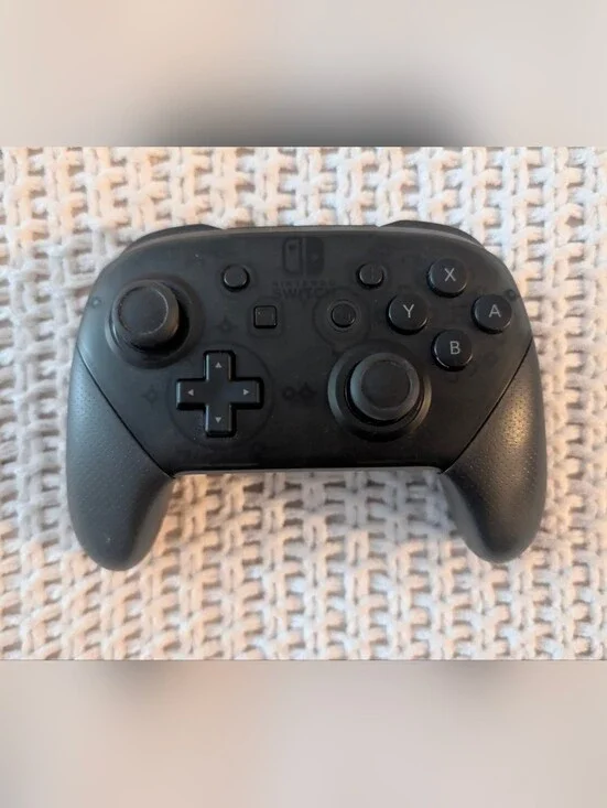 Nintendo Black Wireless Pro Controller for Switch w/ Orzly Charging Stand