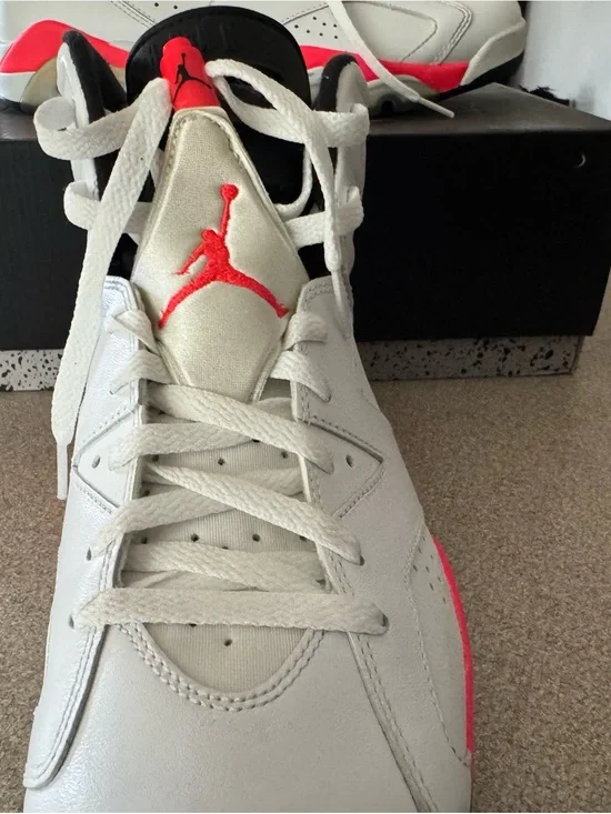 Jordan White Sneakers with Red Jumpman Accents