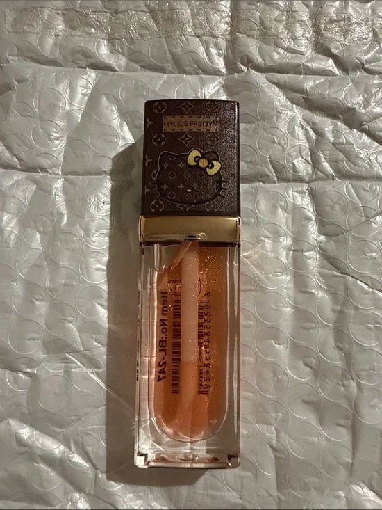 Hello Kitty Shimmery Peach Lip Gloss -