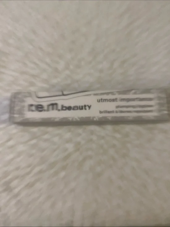 r.e.m. beauty Utmost Importance Lip Gloss - Clear Shimmer