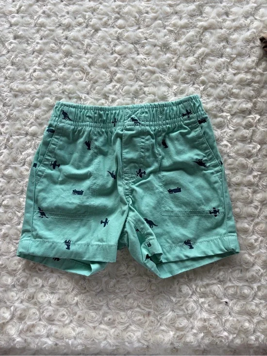 Size 12 Months Carter’s Mint Green & Navy Dinosaur Airplane Truck Print Shorts