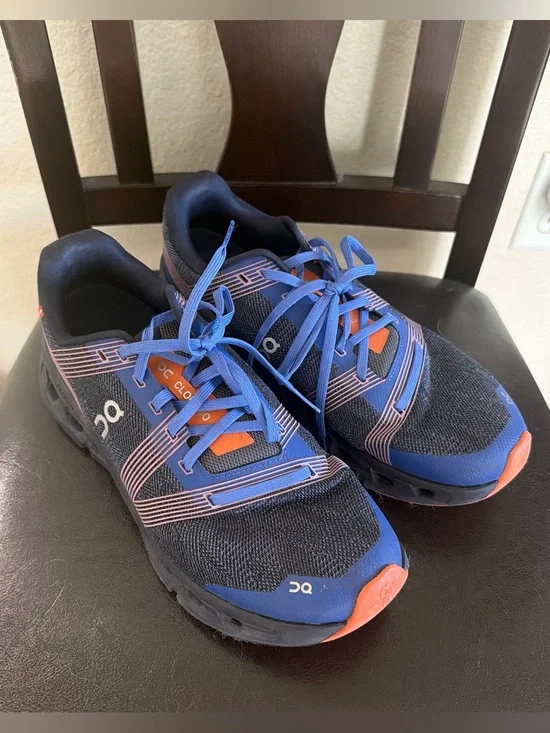 On Running Running Women’s Navy Blue and Orange Cloud Sneakers