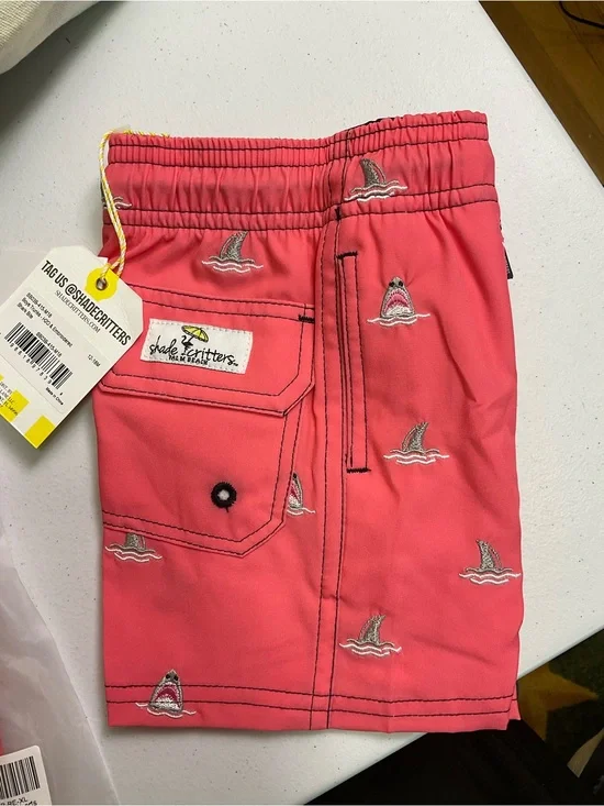 Shark Bite Boys 4 Way Stretch Water Appearing Embroidered Swim Trunks - Coral