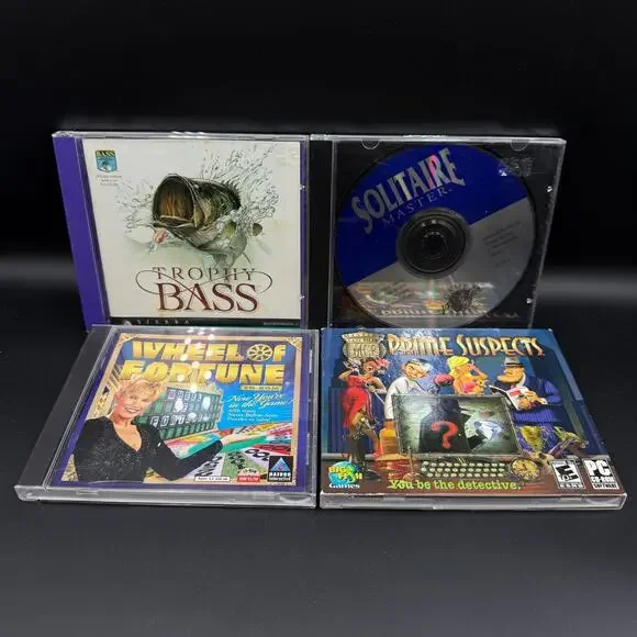 PC Mixed Game Lot of 4 Solitaire Wheel of Fortune Prime Suspects Trophy Bass