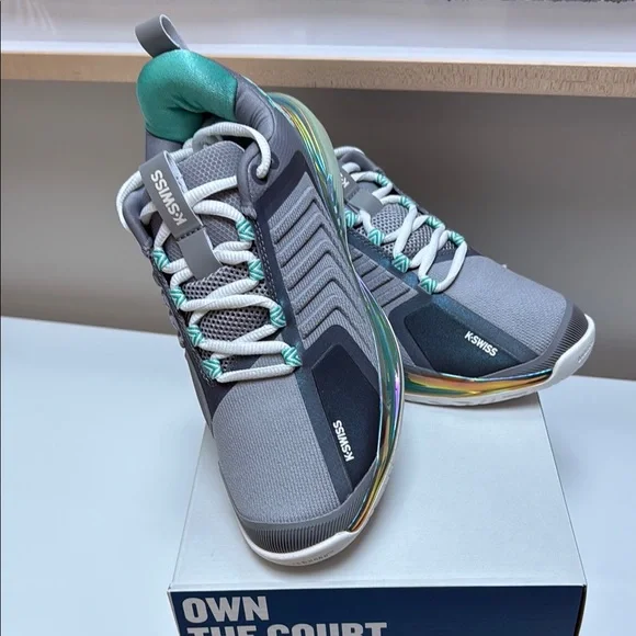 K-Swiss Gray Sneakers with Teal Accents and Iridescent Midsole