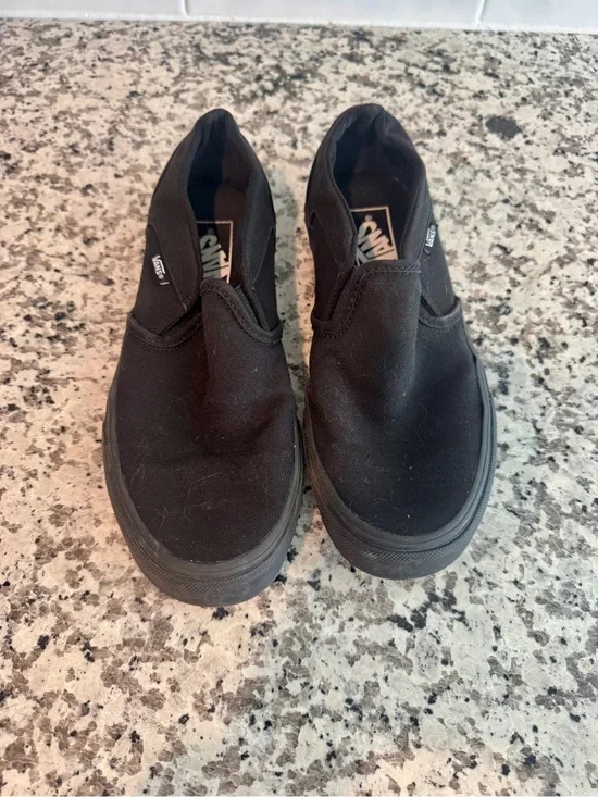 Vans All-Black Slip-On Canvas Sneakers