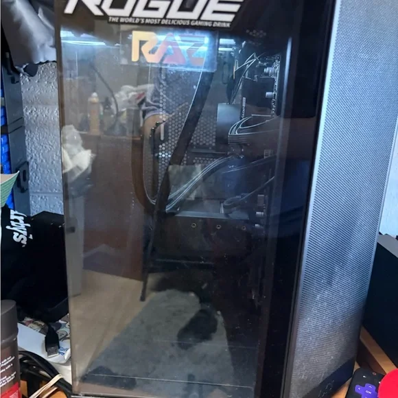 Next Black Gaming pc with two monitors, a gaming chair, razer keyboard, and mic
