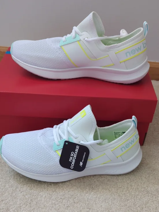 New Balance Women's White Athletic Sneakers with Blue & Yellow