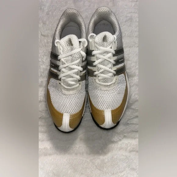 Adidas Traxion Lite S 50/50 Protect women's golf shoes.