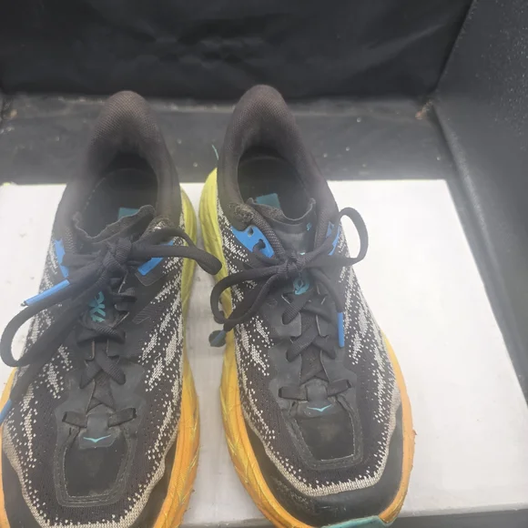 Hoka Black‎ and Yellow Shoes