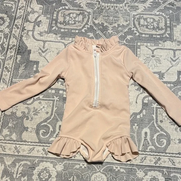 Ruffled cream color Kids One Piece swimsuit. Girls size 100