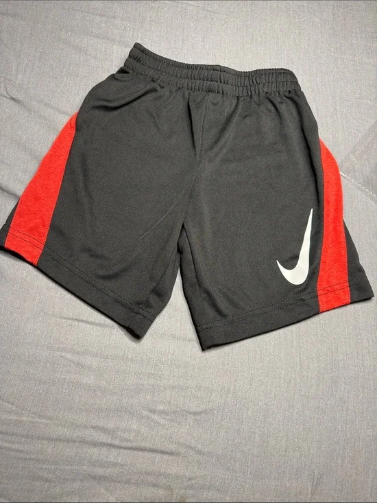 Nike Black Kids Shorts with Red Accent and White Swoosh