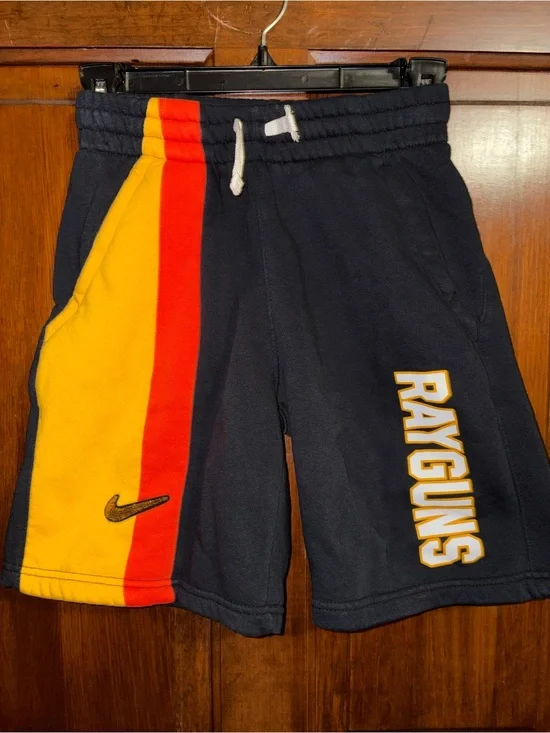 Nike Navy Shorts with Yellow and Red Side Stripes