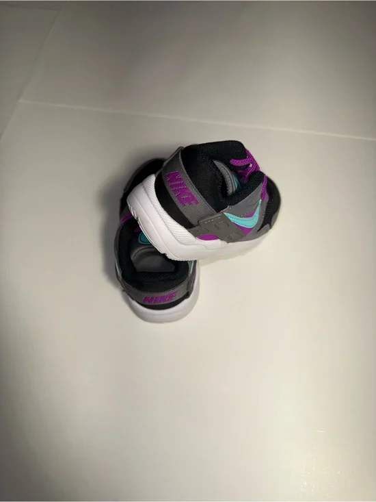 Nike Grey and Black Kids Sneaker with Teal and Purple Accents