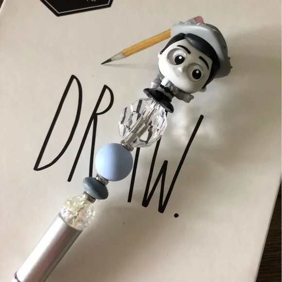 Disney doorables: Toy Story: Woody’s Round Up: Woody handmade beaded pen
