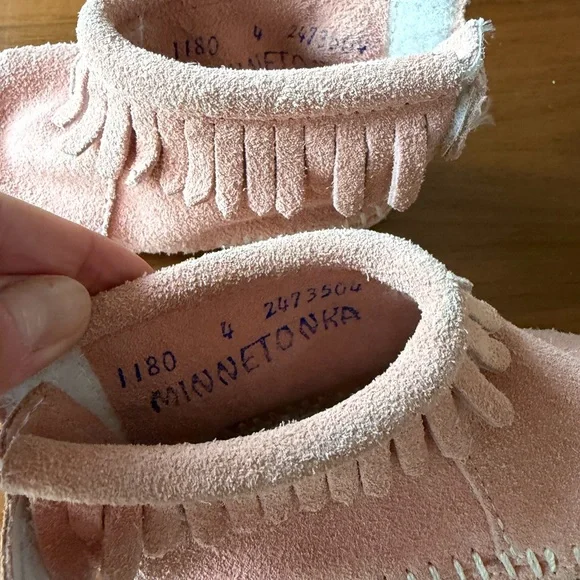 Minnetonka Kids Suede Fringe Moccasins in Light Pink