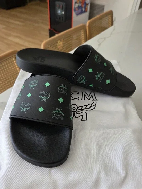 MCM Black Slide Sandals with Green Logo Print
