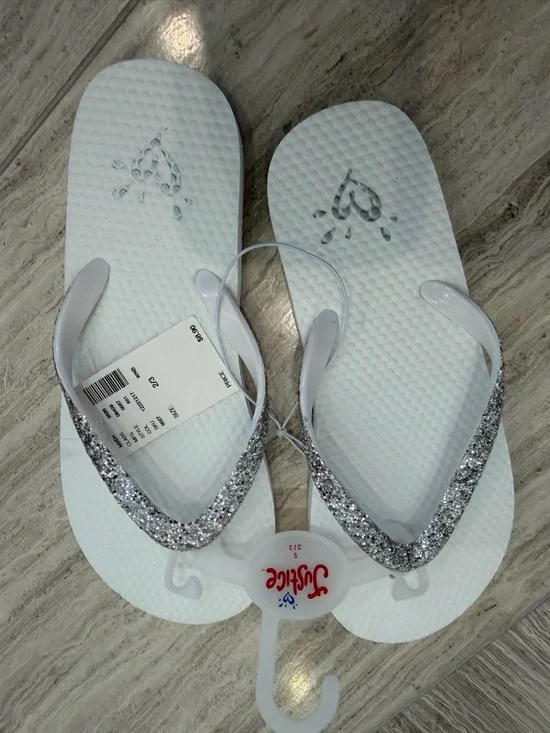Girls Justice White Flip Flops with Silver Glitter Straps. Size 2/3