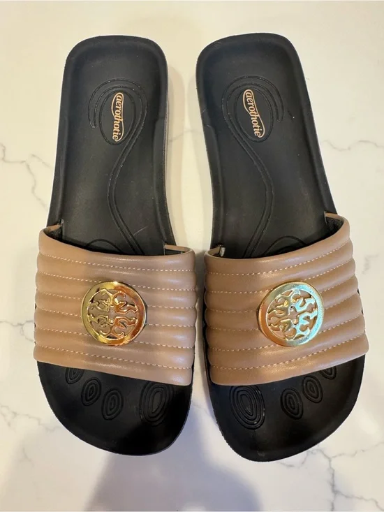 Aerothotic Tan Slide Sandals with Gold Emblem NWOT