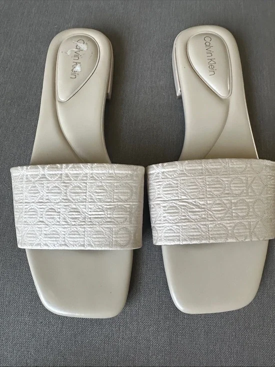 Calvin Klein Pearl White Embossed Logo Slide Sandals