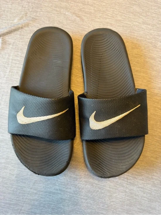 Nike Black Slides with White Swoosh Logo