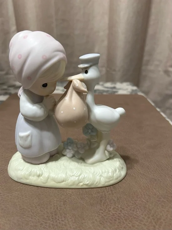 Precious Moments Pink and Cream Stork Baby Figurine