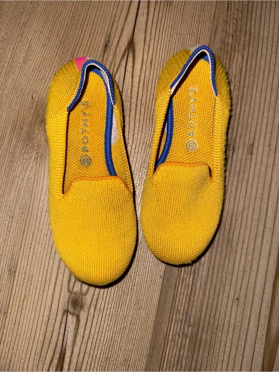 Rothy's Kids Bright Yellow Knit Slip-On Flats with Blue Trim