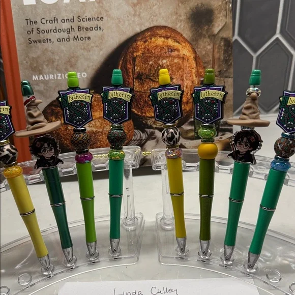 Harry Potter and Slytherin Themed Pens with Charms.