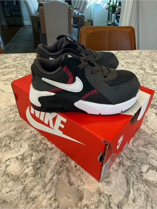 Nike Kids Black/White Sneakers with Red Stitch Accents