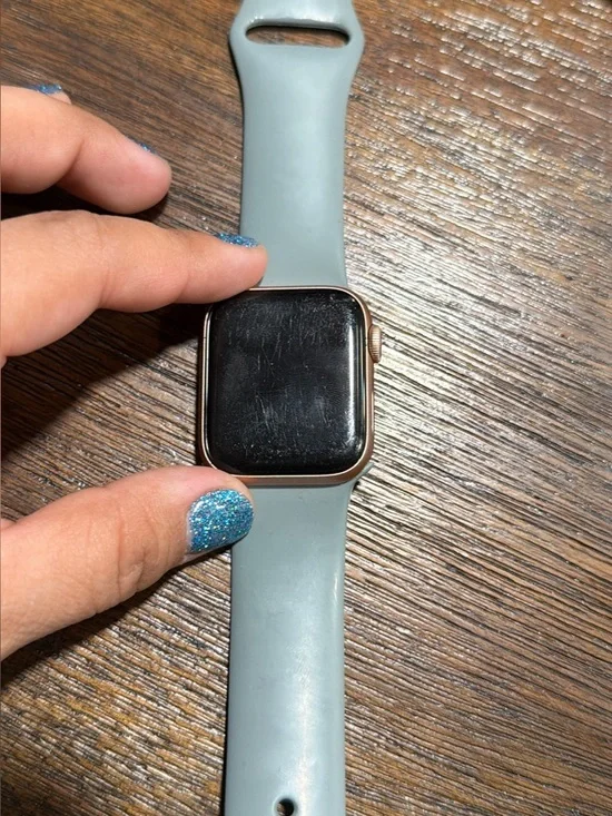 Apple Smartwatch with Pale Blue Silicone Band and Rose Gold Case