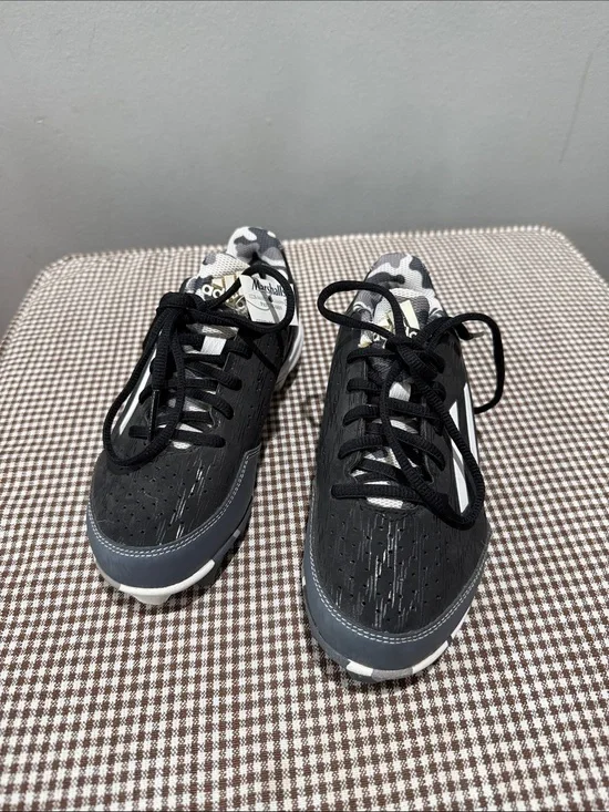 Black Adidas Sneakers cleats with White Stripes and Camo Lining