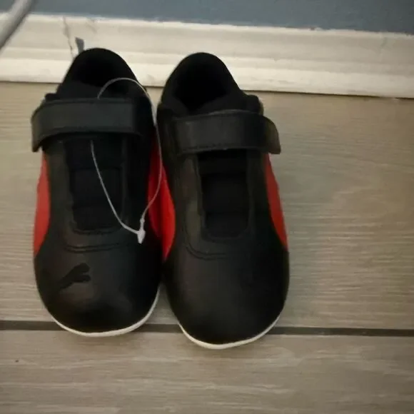Brand new Puma Kids Black and Red Sneakers