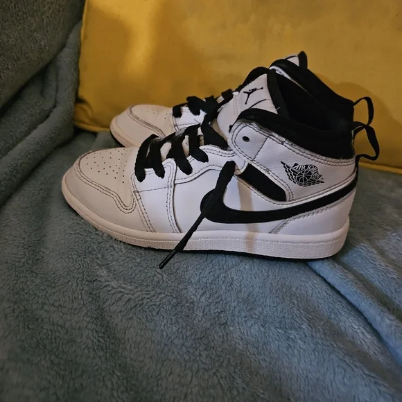 Jordan Kids Black and White High-Top Sneakers