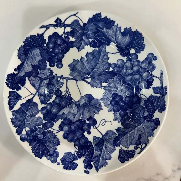 Four Crate and Barrel and Windsor Blue and White Grapevine place settings
