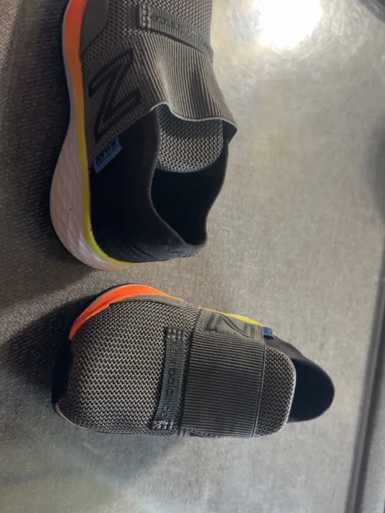 New Balance Gray Knit Slip-On Sneakers with Orange and Yellow Accents