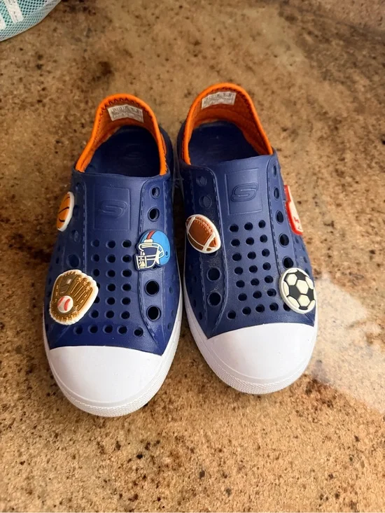 Skechers Kids Navy Blue Slip-On Water Shoes with Orange Lining and Sports Charms
