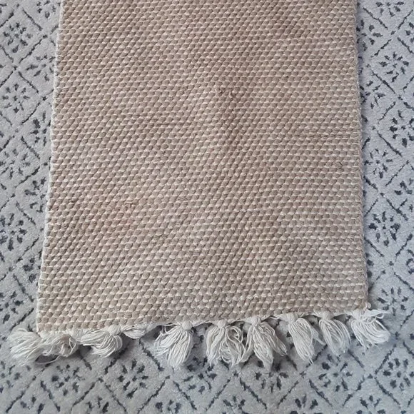 Pair of IKEA Approx. 2x3 Off-White Throw Rugs with Tassels