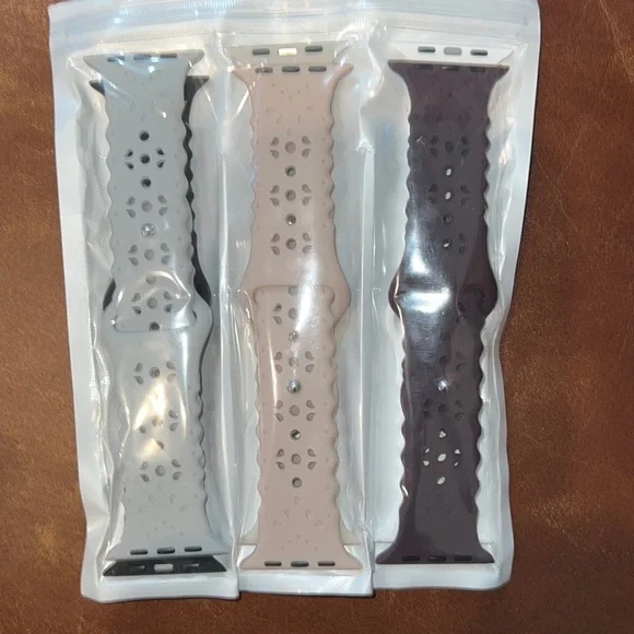 6 bands for Apple Watch.  Gray, Black, Pink, Off white, Brown and White