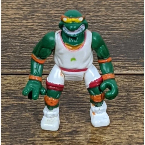 Vintage Teenage Mutant Ninja Turtles Leonardo Action Figure with Paint Wear‎