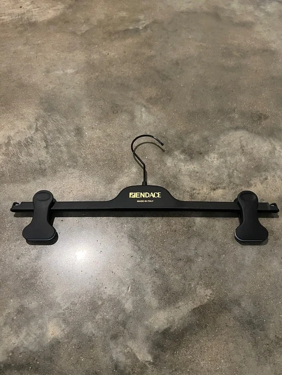 Authentic Fendace Branded Black Hanger with Gold Logo