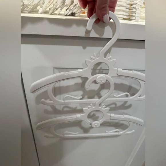 Plastic infant/child adjustable and stackable Hangers with Cute Design