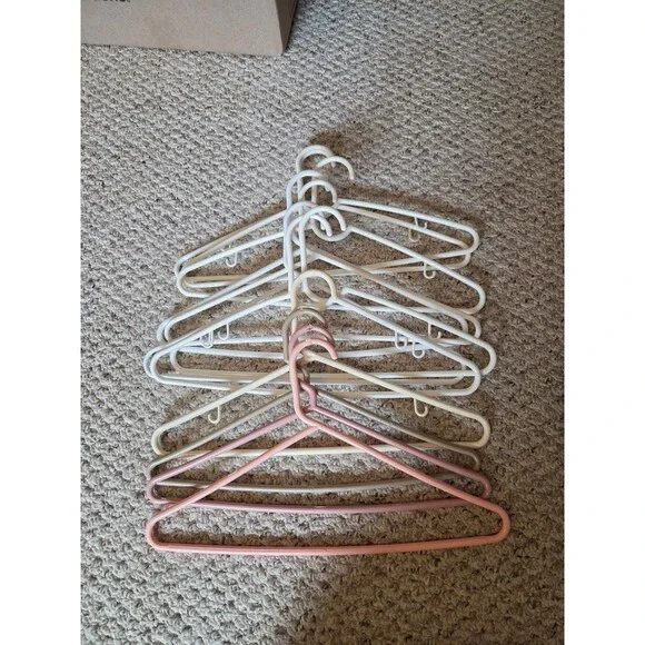 Bundle of Light Colored Hangers