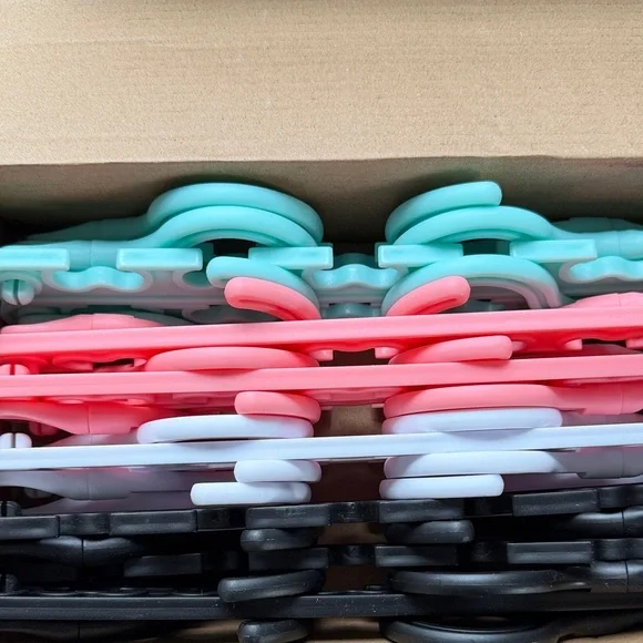 12 pack of Multicolor Plastic closet or organizers Mint, Coral, White, Black